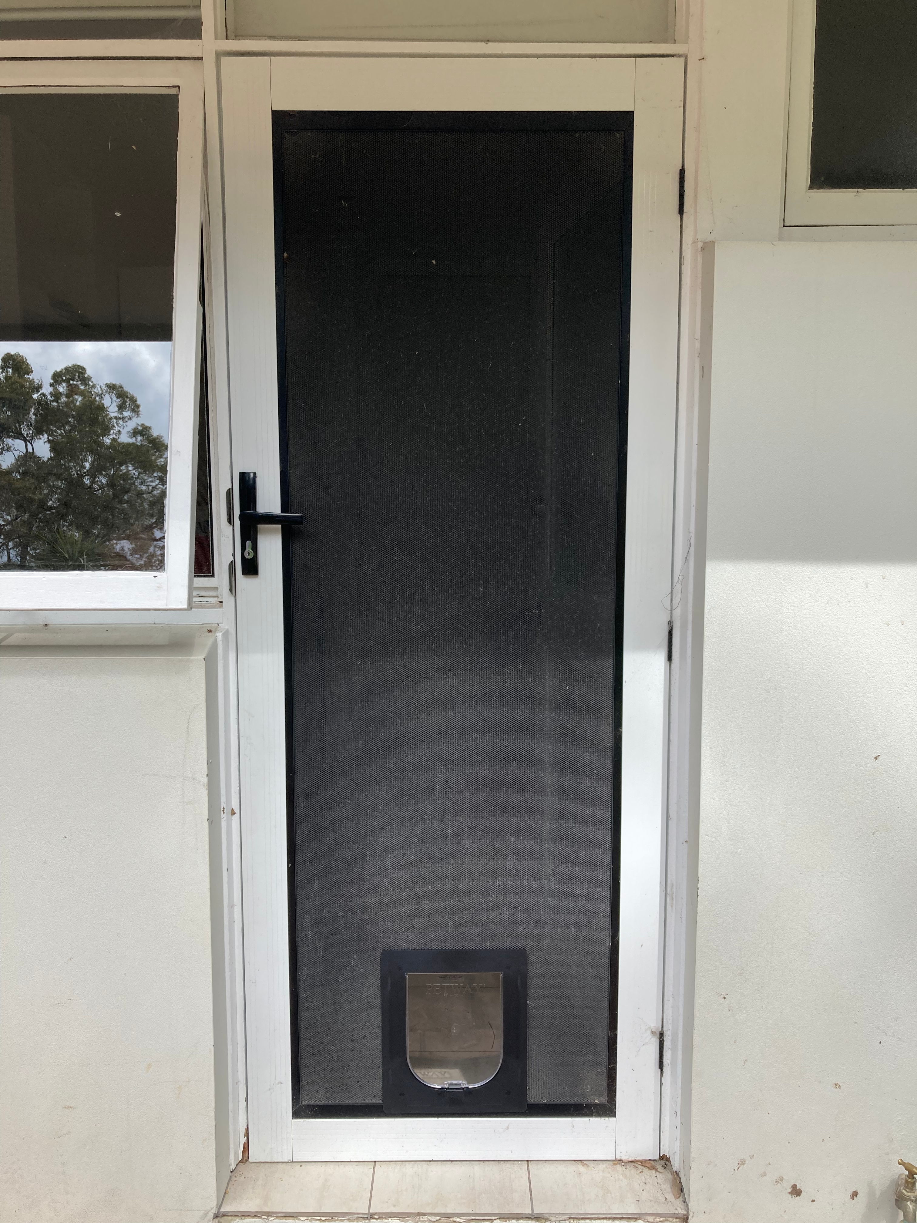 Discover the perfect solution for cat door installations in screens. Our expert technicians are skilled in integrating cat doors into screen doors and windows, allowing your furry friends to come and go as they please while keeping insects and pests out.