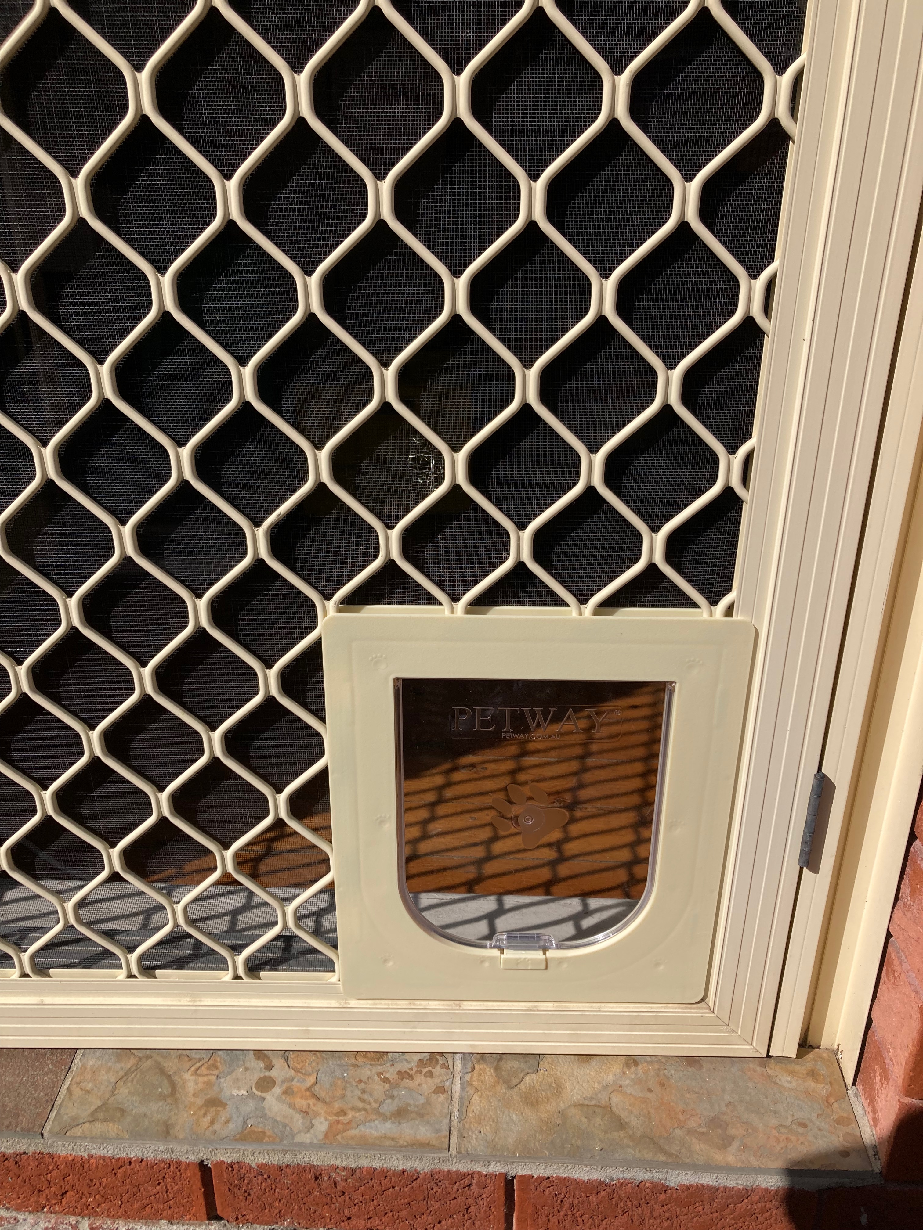 Allow your small dog to come and go as they please with our small dog door installation service in screen doors. We specialise in seamlessly integrating small dog doors into screen surfaces, providing convenient access for your furry friend while keeping insects and pests out.