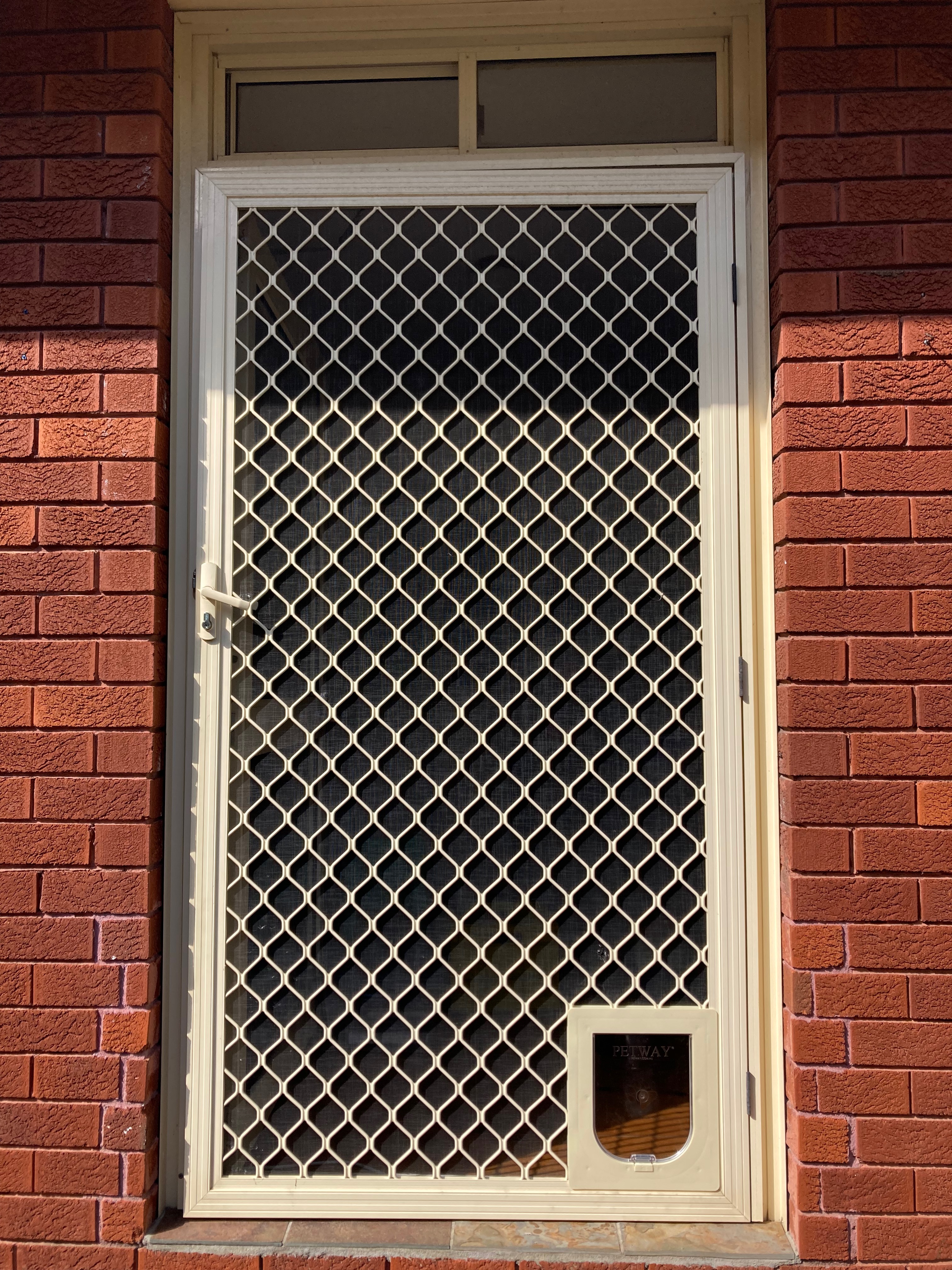 Allow your small dog to come and go as they please with our small dog door installation service in screen doors. We specialise in seamlessly integrating small dog doors into screen surfaces, providing convenient access for your furry friend while keeping insects and pests out.