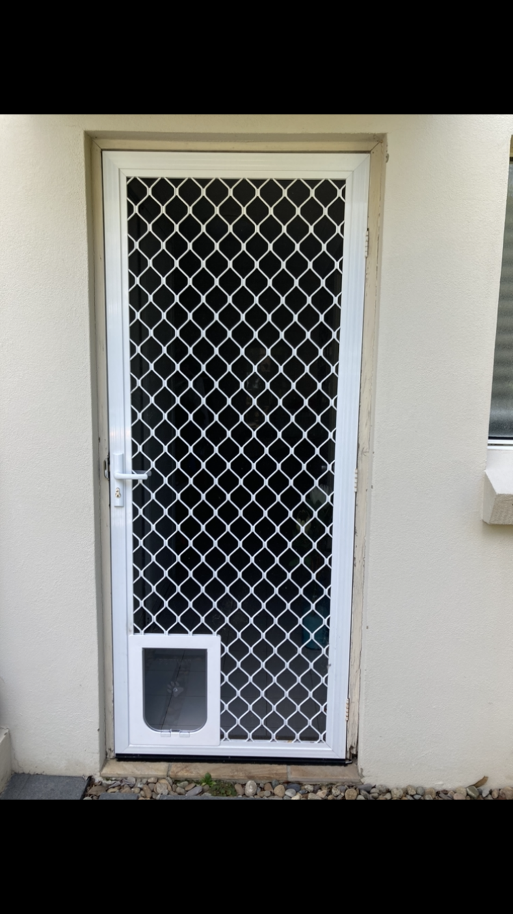 Allow your small dog to come and go as they please with our small dog door installation service in screen doors. We specialise in seamlessly integrating small dog doors into screen surfaces, providing convenient access for your furry friend while keeping insects and pests out.