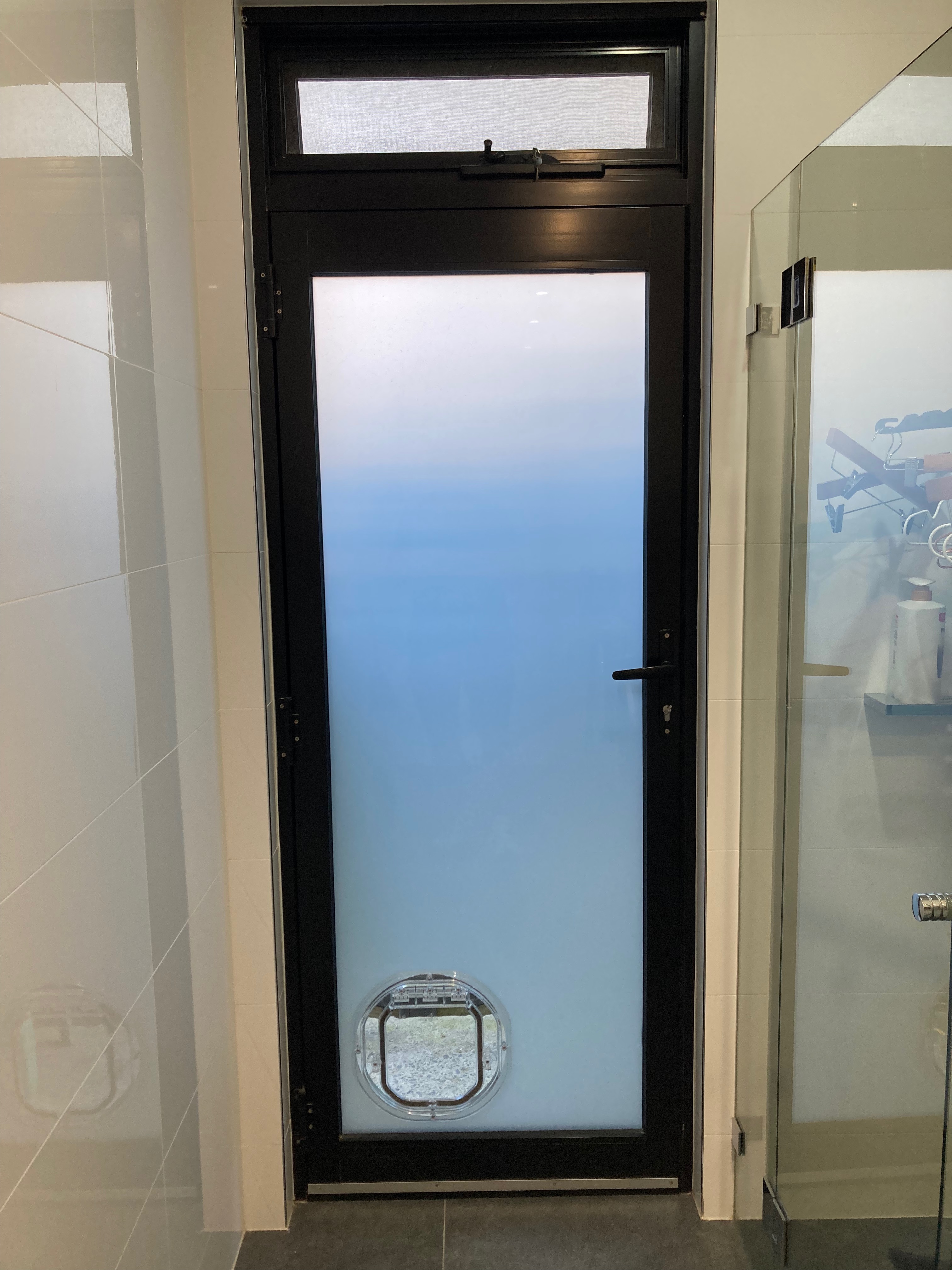 Provide your small canine companion with easy access to the outdoors while maintaining the sleek appearance of your glass surfaces with our small dog door installation service in glass. We specialise in seamlessly integrating small dog doors into glass panels, ensuring a secure and durable entry point for your furry friend.