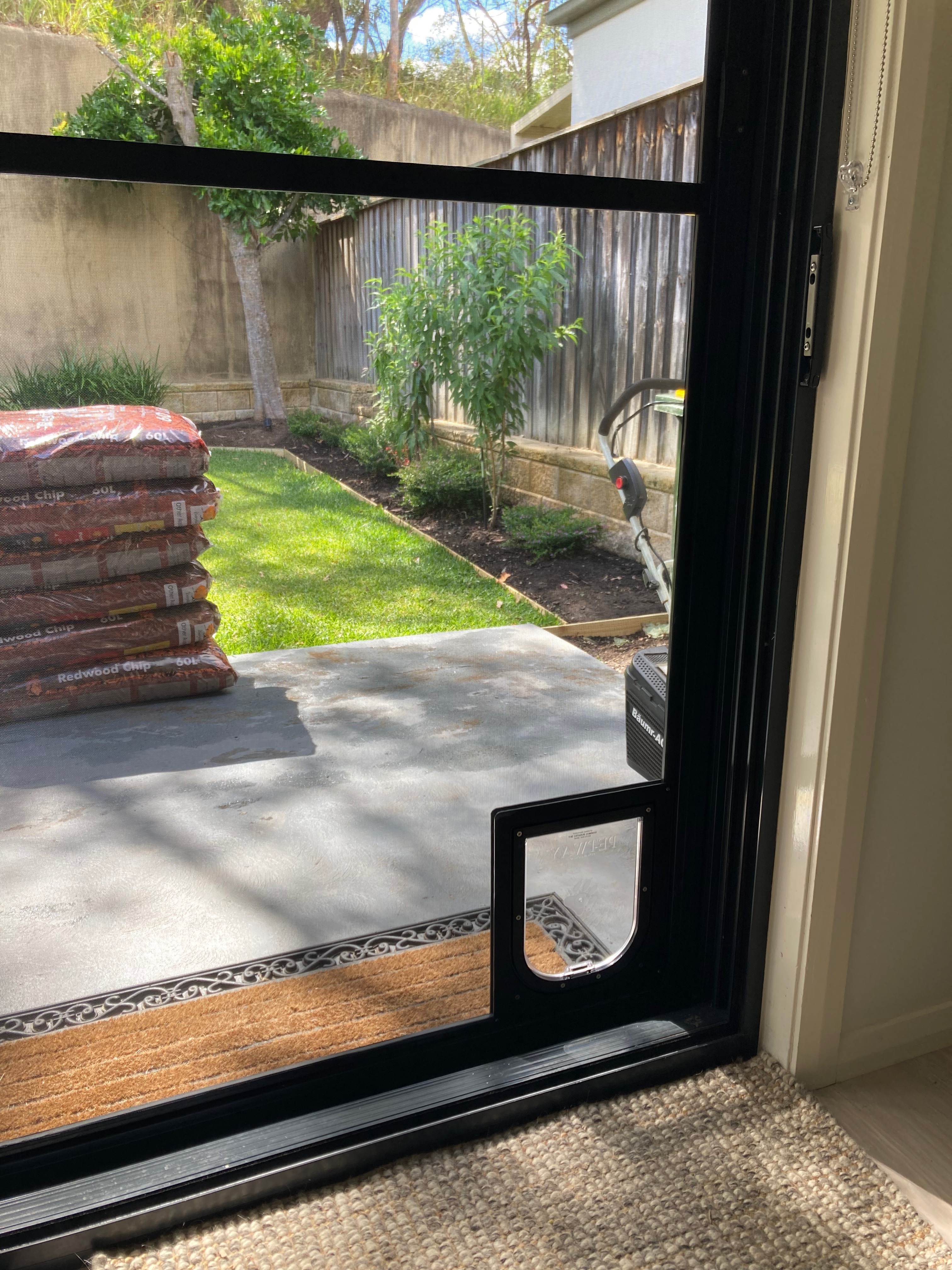 Allow your small dog to come and go as they please with our small dog door installation service in screen doors. We specialise in seamlessly integrating small dog doors into screen surfaces, providing convenient access for your furry friend while keeping insects and pests out.