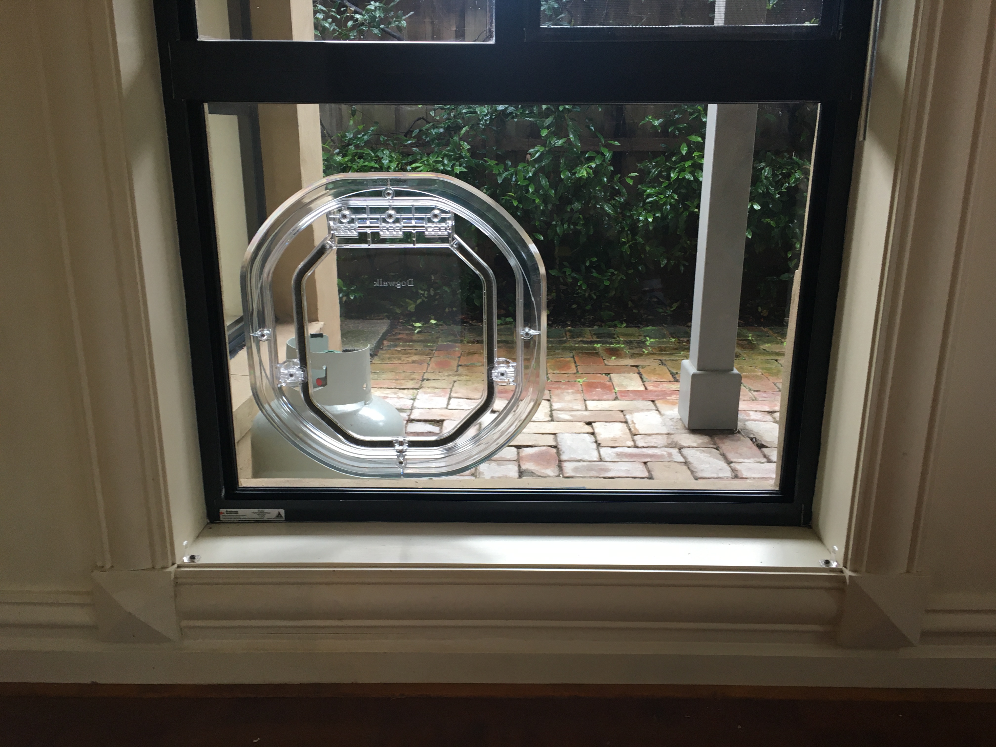 Provide your small canine companion with easy access to the outdoors while maintaining the sleek appearance of your glass surfaces with our small dog door installation service in glass. We specialise in seamlessly integrating small dog doors into glass panels, ensuring a secure and durable entry point for your furry friend.