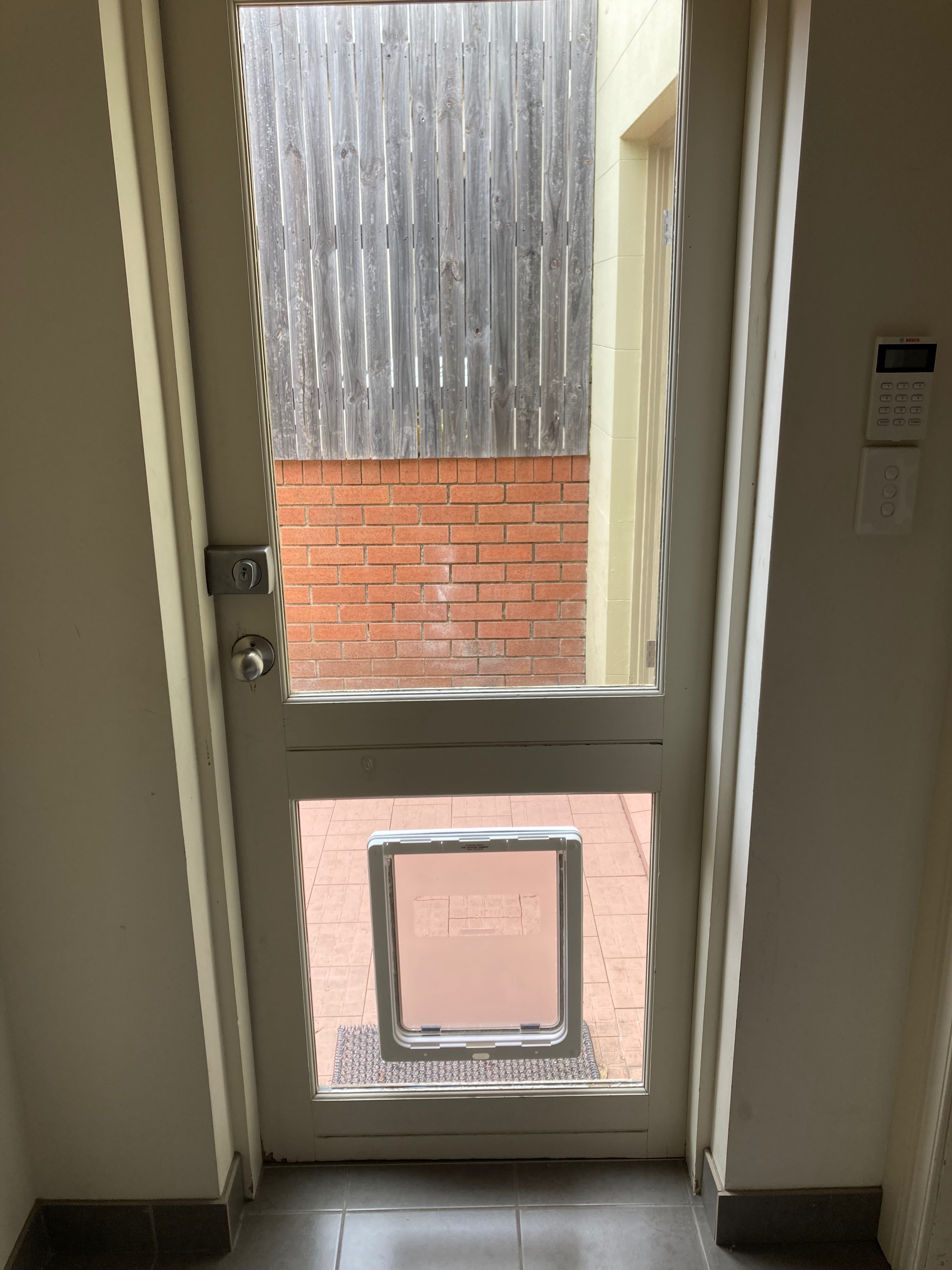 Let your large canine companion come and go as they please with our large dog door installation service in glass. We specialise in seamlessly integrating large dog doors into glass panels, ensuring a secure and durable entry point for your furry friend.