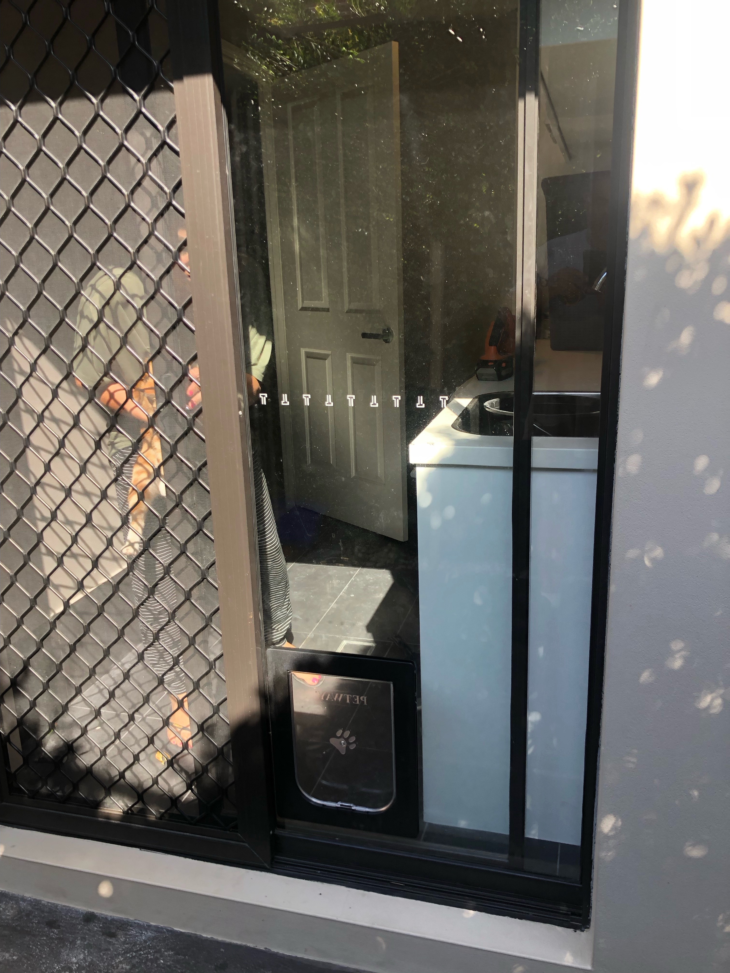 Let your large canine companion come and go as they please with our large dog door installation service in glass. We specialise in seamlessly integrating large dog doors into glass panels, ensuring a secure and durable entry point for your furry friend.
