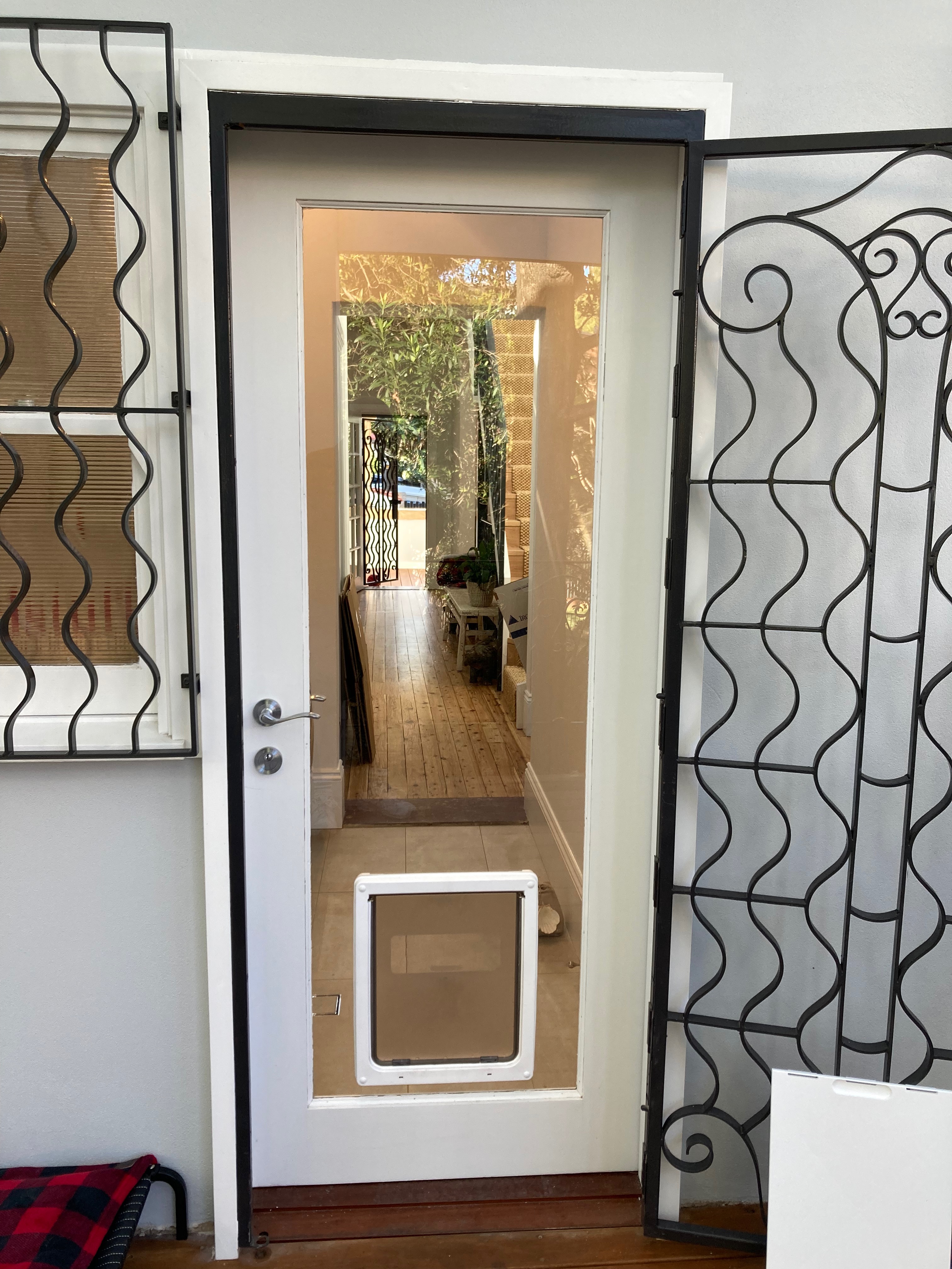 Let your large canine companion come and go as they please with our large dog door installation service in glass. We specialise in seamlessly integrating large dog doors into glass panels, ensuring a secure and durable entry point for your furry friend.